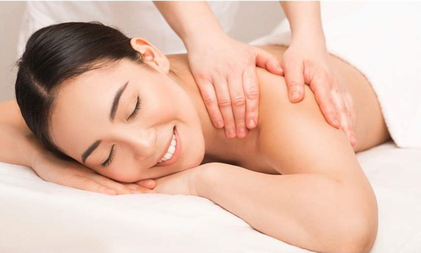 Happy client enjoying a relaxing massage